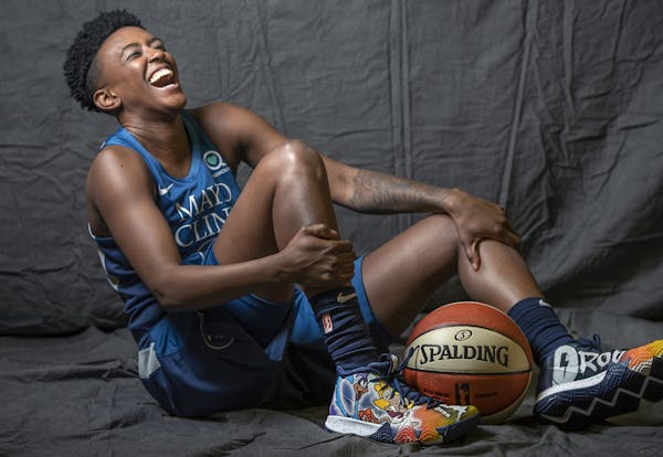 Minnesota Lynx guard Danielle Robinson broke out in laughter during a photo shoot during Media day at the Target Center, Thursday, May 16, 2019 in Min