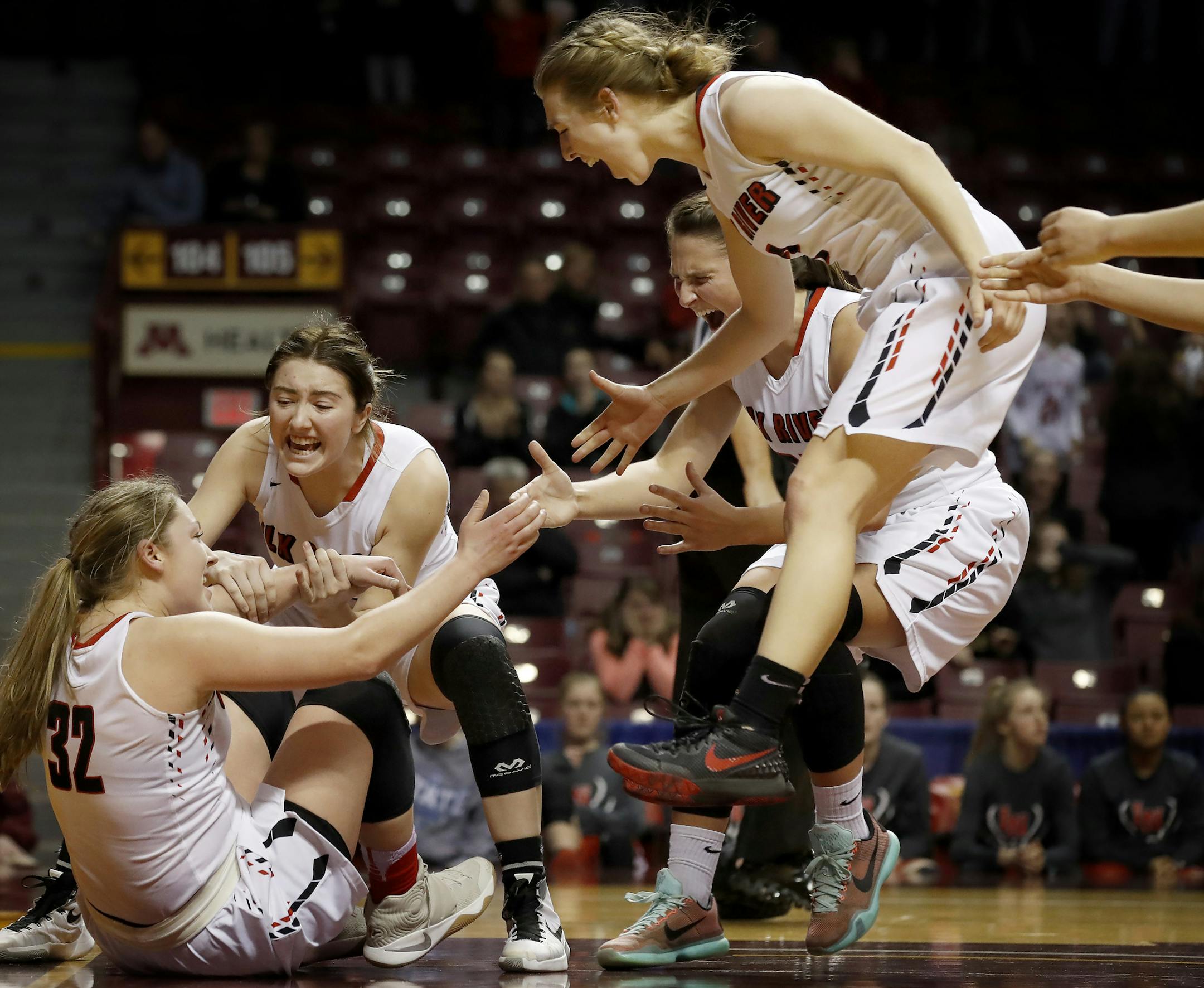Elk River players reacted after Gabi Haack (32) took a charge late in the second half. Elk River beat Lakeville North 57-56. ] CARLOS GONZALEZ ï cgonzalez@startribune.com - March 16, 2017, Minneapolis, MN, Williams Arena, girls high school prep basketball, semifinals game, Class 4A semifinals, Elk River vs. Lakeville North