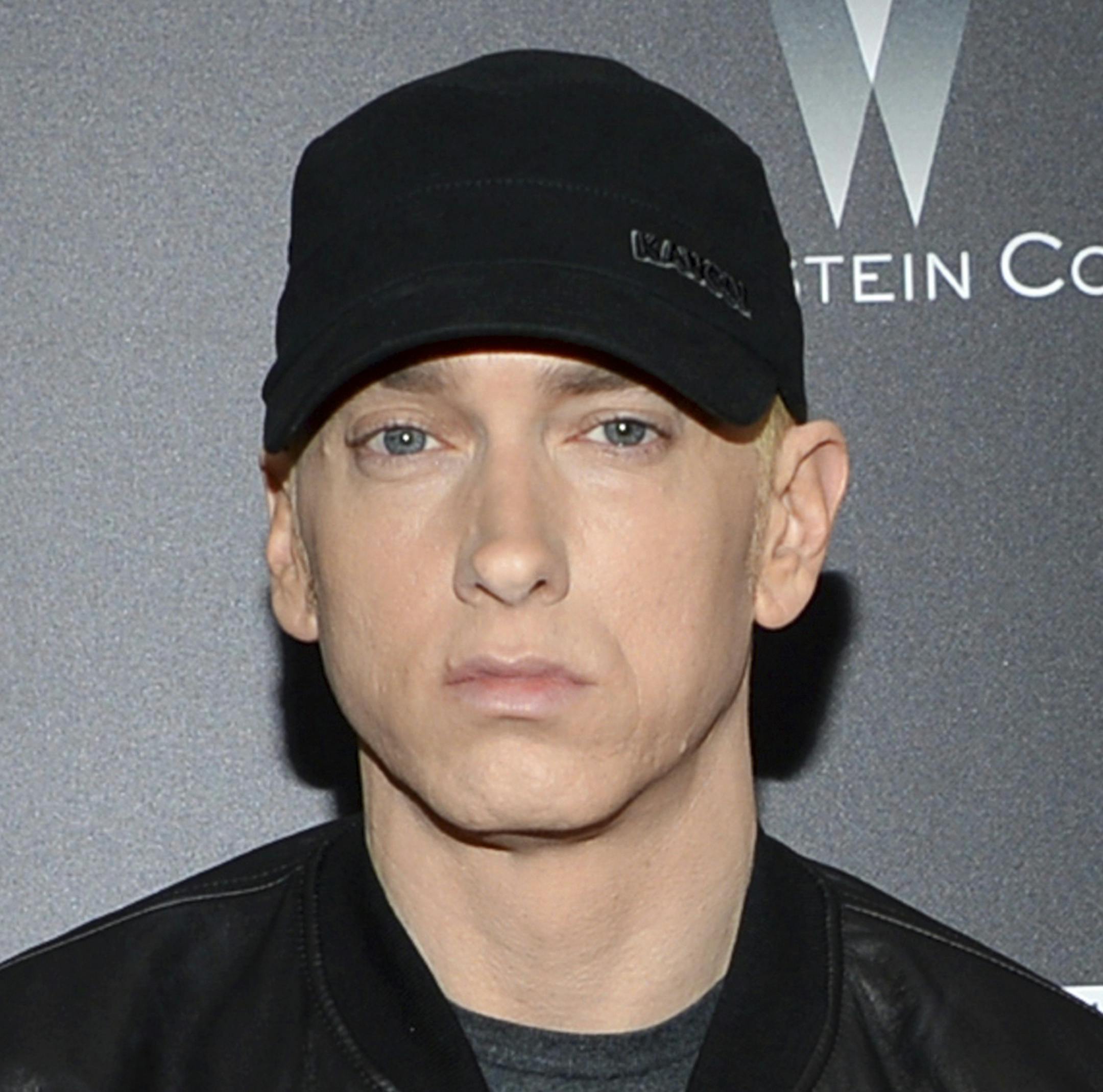 FILE - In this July 20, 2015, file photo, rapper Eminem attends the premiere of "Southpaw" in New York. Eminem released his new album “Kamikaze” on Friday, Aug. 31, 2018. (Photo by Evan Agostini/Invision/AP, File)