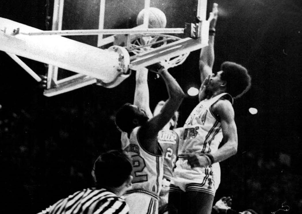 Dave Winfield (right) went up to block a shot against Purdue in 1972. The other Gophers in the photo are Clyde Turner and Jim Brewer.