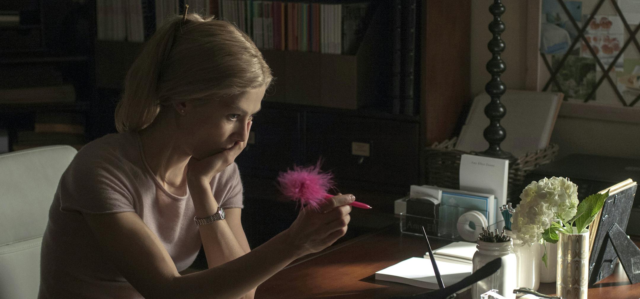 In this image released by 20th Century Fox, Rosamund Pike appears in a scene from "Gone Girl." The film, based on the best-selling novel, will release on Oct. 3. (AP Photo/20th Century Fox, Merrick Morton)