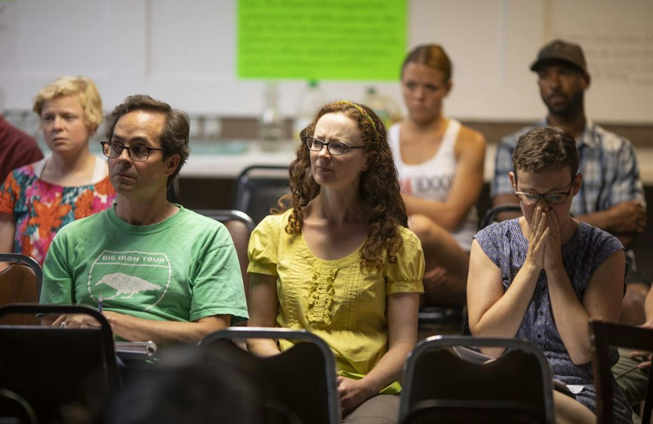 Audience members reacted to viewing footage of the shooting of Philando Castile during a presentation at the beginning of the forum.