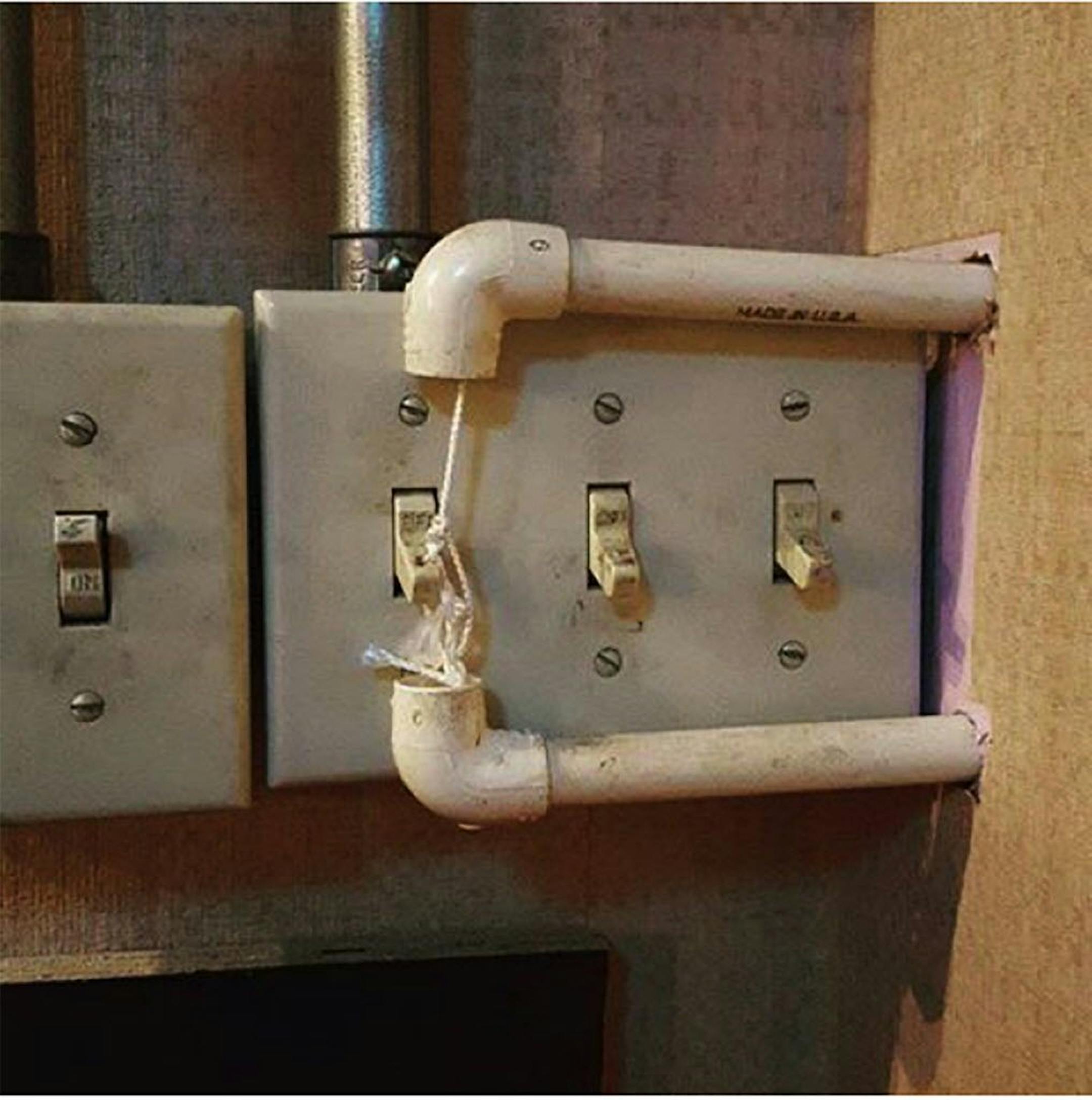 An undated handout photo of a creative marriage of plumbing and electrical fixtures in a home, found by inspectors. When a home is sold, its many secrets can come out of the closet. Brokers, potential buyers and home inspectors step inside properties that may have been completely private for years � peering into the life of the previous owner. (Handout via The New York Times)