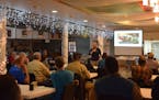 Dairy farmers gathered at the Greenwald Pub in Greenwald, Minn., on Tuesday, April 16, to discuss ideas for saving small dairies that are pressured by
