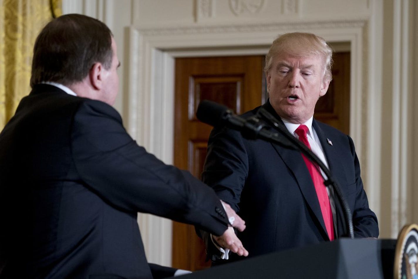 President Donald Trump and Swedish Prime Minister Stefan Lofven shake hands during a news conference at the White House on Tuesday. Sweden has offered to help the U.S. with talks with North Korea.