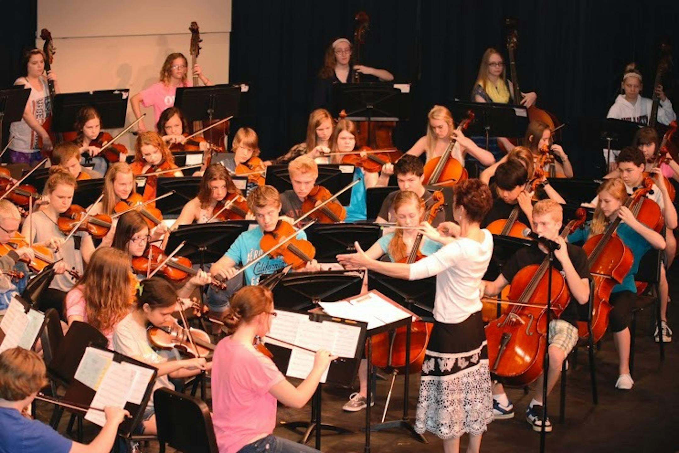 Led by teacher Julie Schmidt, orchestra students at Anoka Middle School for the Arts worked on their production of "Dynamite" shortly before the end of the last school year. Credit: Anoka Middle School for the Arts