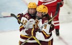 Gophers forward Grace Zumwinkle (12) was mobbed by Taylor Heise after she scored the Gophers third goal vs. Ohio State in November.