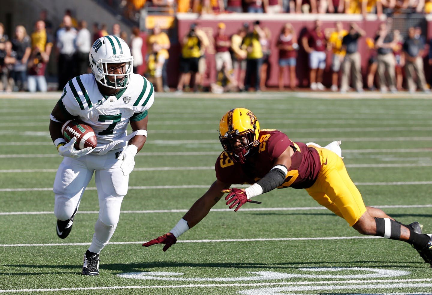 Ohio running back Daz'mond Patterson (7) leaves behind Minnesota defensive back Briean Boddy-Calhoun (29) on Saturday.