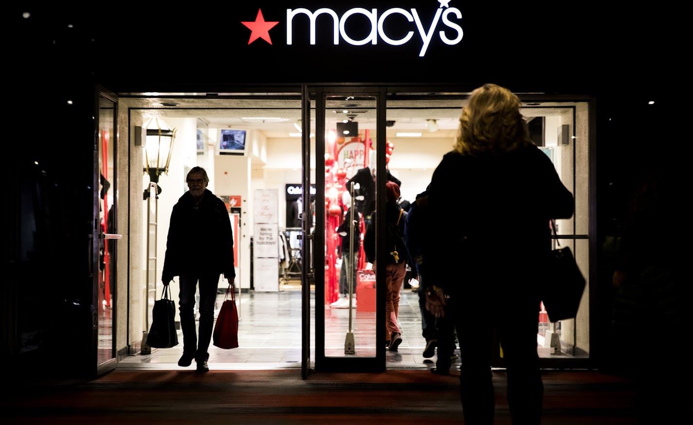 People walk in the skyway over Nicollet Mall in and out of Macy's in downtown Minneapolis. ] (Leila Navidi/Star Tribune) leila.navidi@startribune.com BACKGROUND INFORMATION: Macy's in downtown Minneapolis seen on Thursday, December 1, 2016. Rumor that Macy's in downtown Minneapolis will close this year.