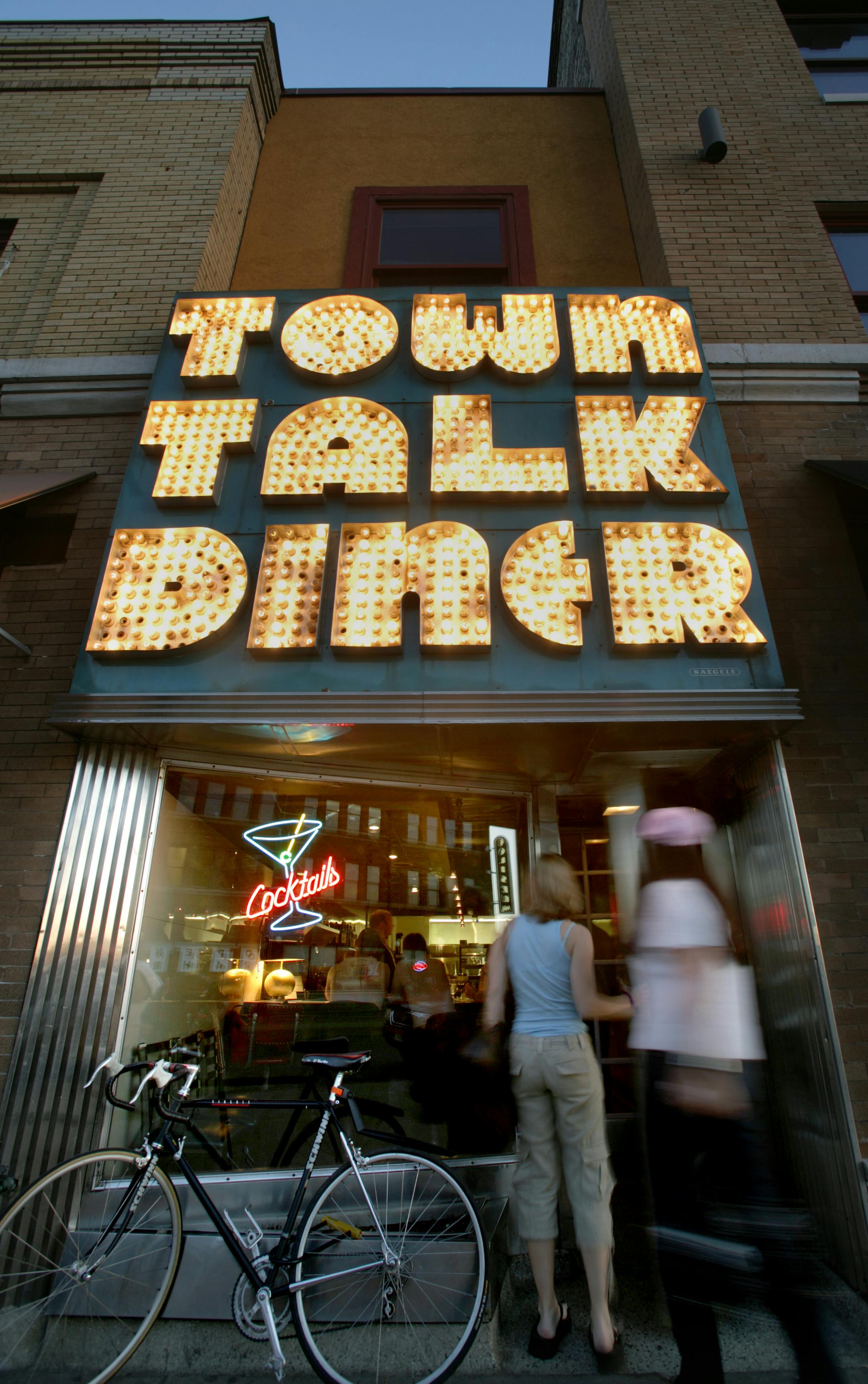 Patrons enter the Town Talk Diner.