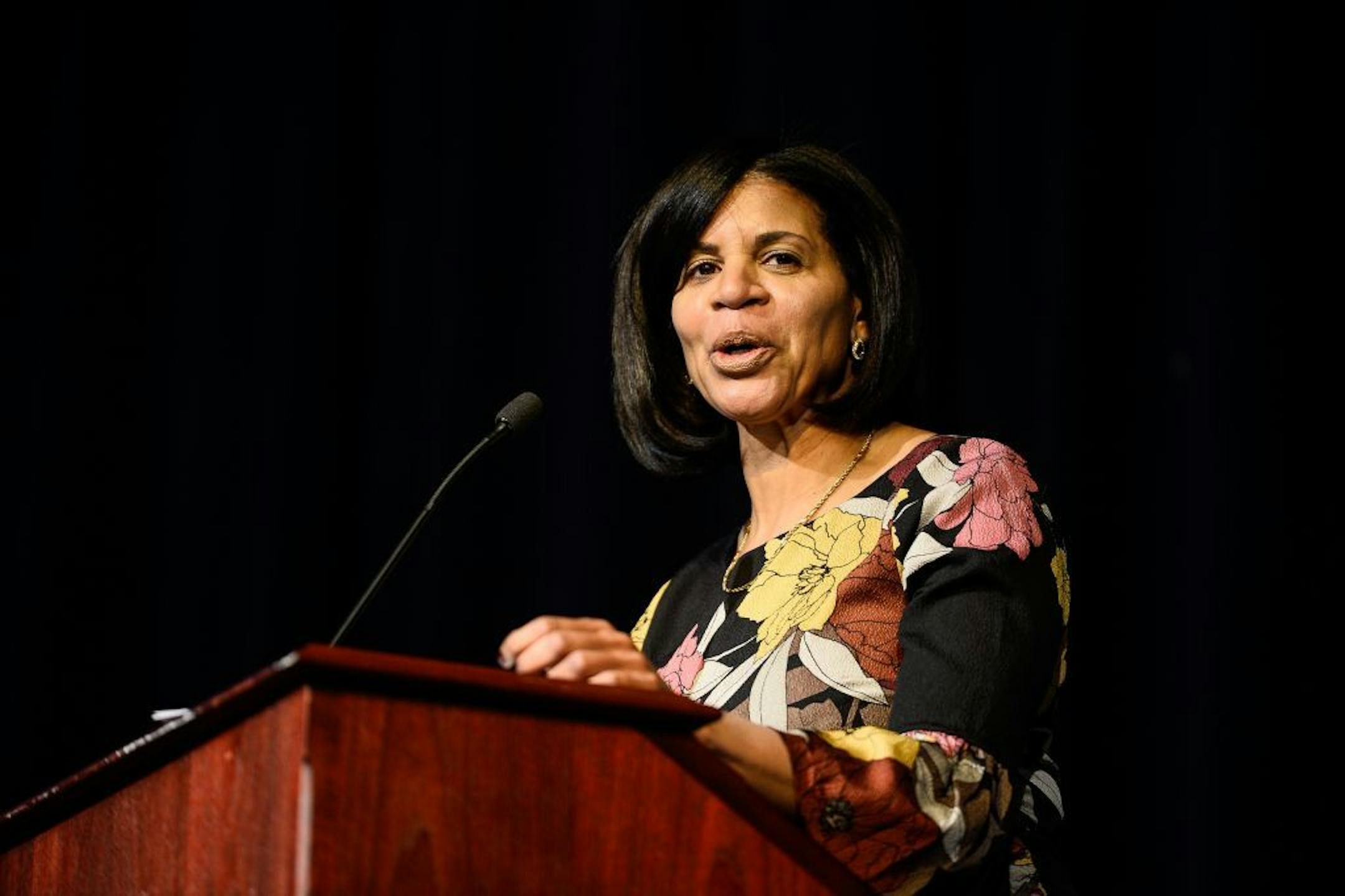 Cheryl Logan, the chief academic support officer for The School District of Philadelphia, introduced herself at the start of Wednesday night's community meeting at Washington Technology Magnet School. She is one of two candidates for the St. Paul Public Schools superintendent job.