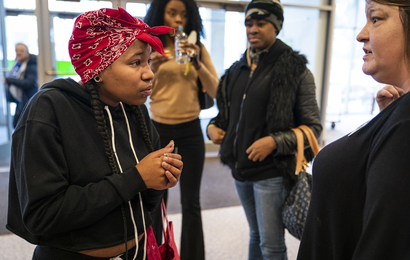 Shalini Dugas, left, a displaced Drake Hotel resident, spoke with a provider about getting medical services. ] LEILA NAVIDI &#x2022; leila.navidi@startribune.com BACKGROUND INFORMATION: A resource center for those displaced in the Drake Hotel fire opened at Bethlehem Baptist Church in Minneapolis on Friday, January 3, 2020.