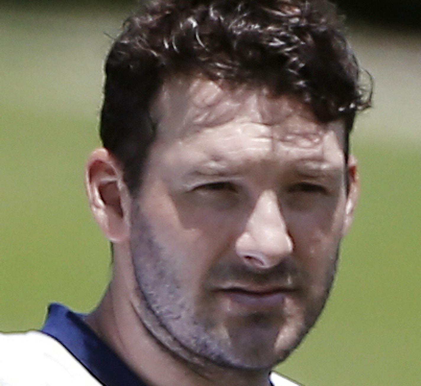 Dallas Cowboys quarterback Tony Romo gives instructions to a teammate during an NFL football organized team activity, Wednesday, May 27, 2015, in Irving, Texas. (AP Photo/Brandon Wade)