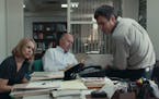 In "Spotlight," Gary Galone as Jack Dunn, right, is confronted by Michael Keaton as Boston Globe editor Walter Robinson and Rachel McAdams portraying 