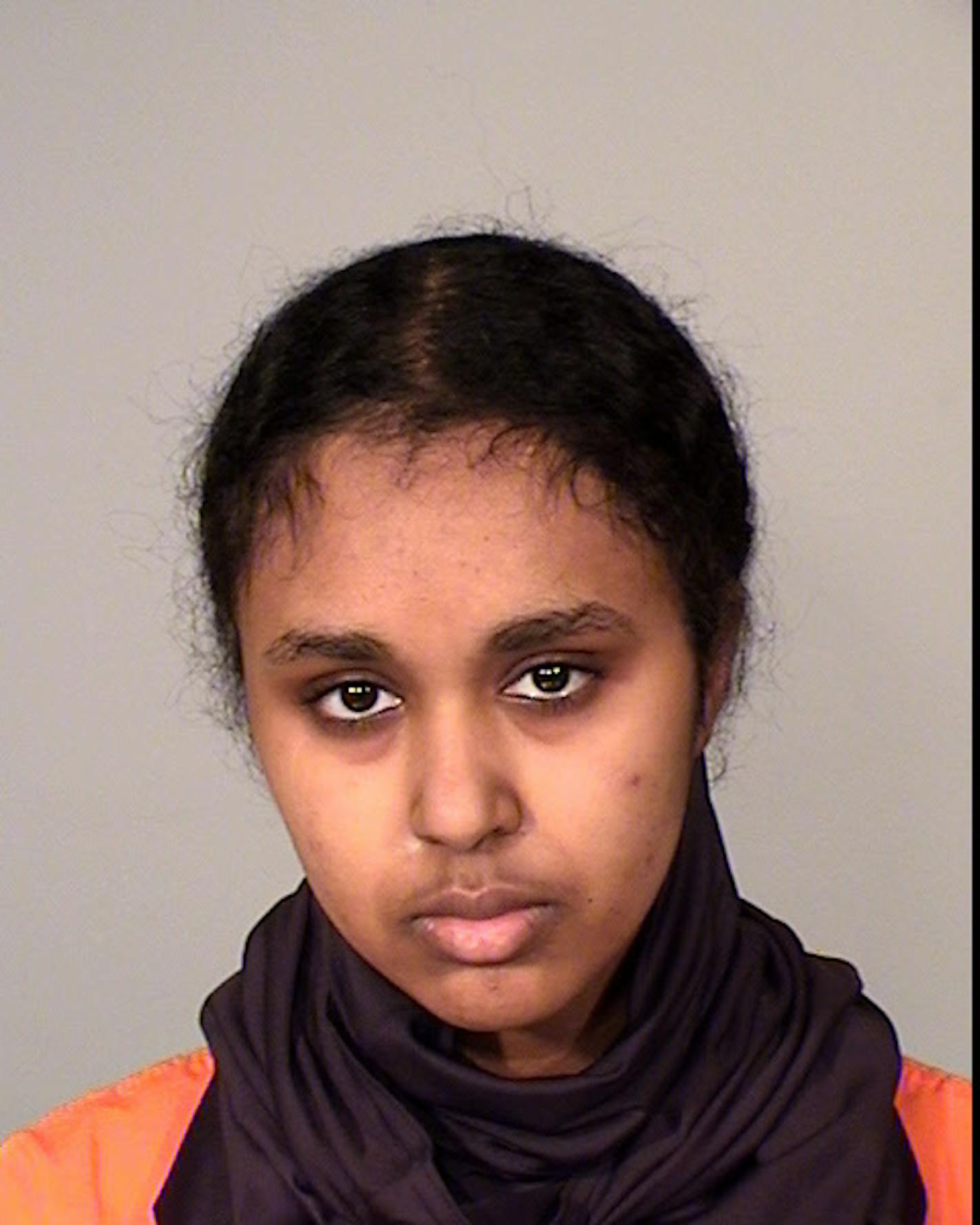 This photo provided by the Ramsey County Sheriff's Office shows Tnuza Jamal Hassan. A criminal complaint said Hassan, 19, a former student at St. Catherine University in St. Paul, admitted to investigators that she started the fires on Wednesday, Jan. 17, 2018, including one in a dormitory that housed a day care center. She's charged with first-degree arson. (Ramsey County Sheriff's Office via AP)