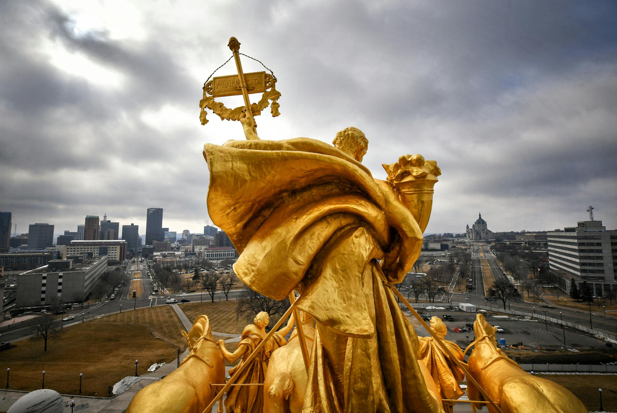 The refurbished Quadriga above the Minnesota State Capitol South Portico looks out to downtown Saint Paul and the Cathedral of Saint Paul. ] GLEN STUBBE &#x2022; glen.stubbe@startribune.com Friday, March 17, 2017 As Legislators and staff worked inside the Minnesota State Capitol, extensive renovation was still going on above them on the roof and the chamber domes above the House, Senate and Supreme Court.