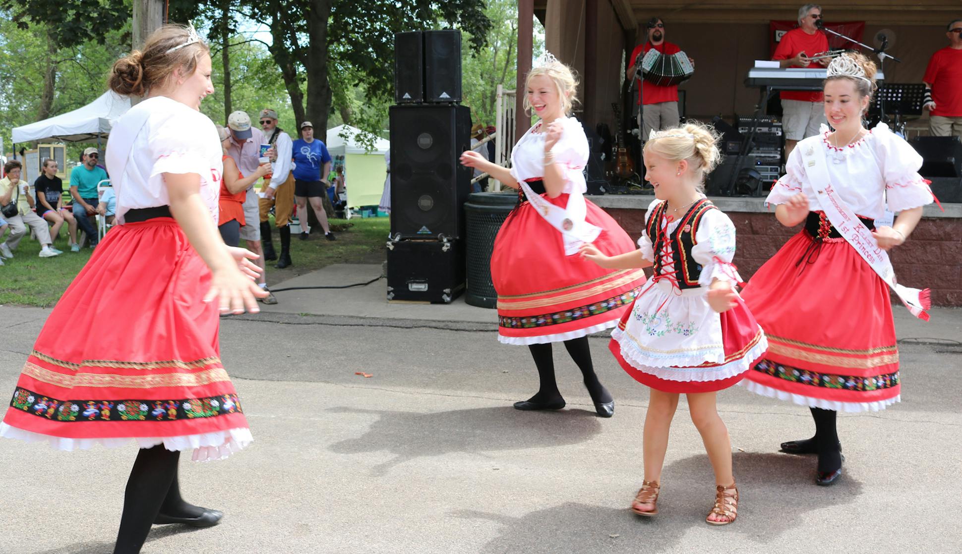 Kolacky Days in Montgomery, Minn., salutes the city's Czech heritage. Marisa Rotter -- a former Kolacky Queen herself -- took this photo of her daughter dancing in the park with this year's Kolacky Days royalty at the 82nd annual festival.