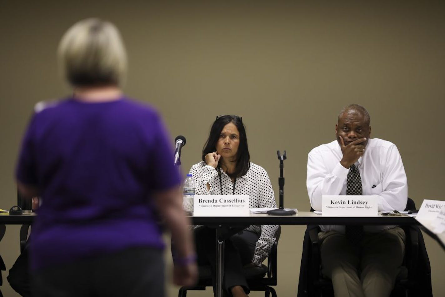 Brenda Cassellius, Minnesota Commissioner of Education and Kevin Lindsey, Minnesota Commissioner of Human Rights listened to comments from a supporter of the adoption of the toolkit Wednesday afternoon.