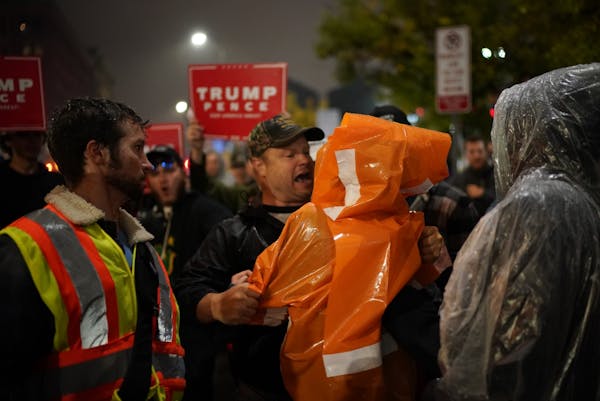 Pro and anti-Trump people confront eachother after the President's rally.