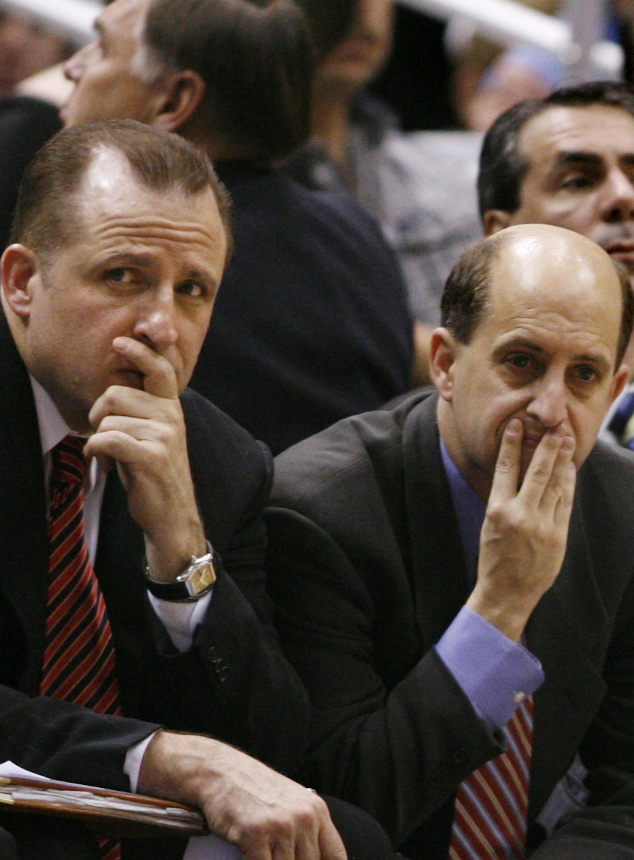 Houston Rockets coach Jeff Van Gundy, center, and assistant coaches Tom Thibodeau, left, and Steve Clifford wait for the NBA basketball playoff game against the Utah Jazz to end, during the fourth quarter Saturday, April 28, 2007, in Salt Lake City. The Jazz beat the Rockets 98-85 to even the series at two games all. (AP Photo/Steve C. Wilson) ORG XMIT: SLCC114