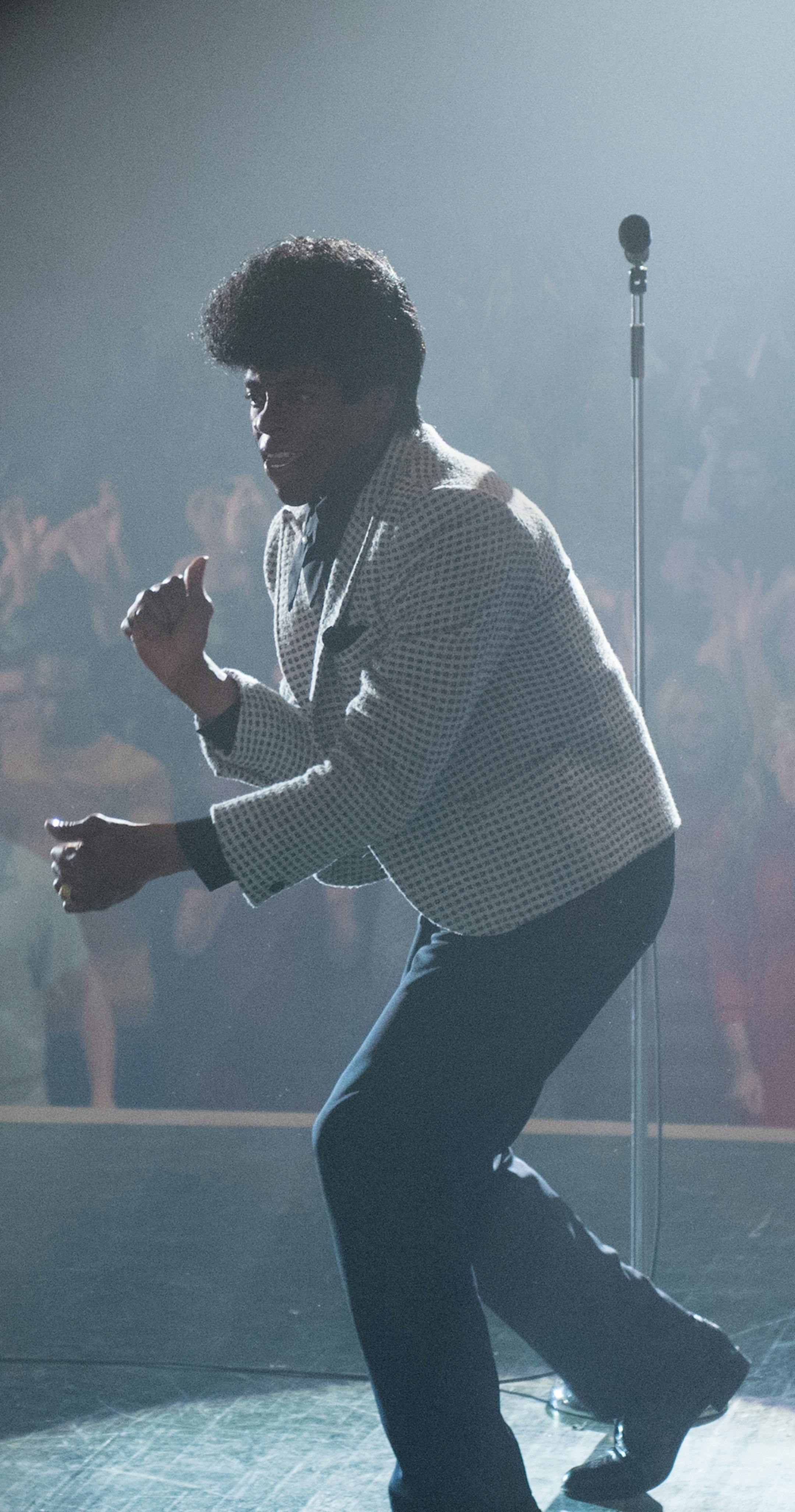 CHADWICK BOSEMAN as James Brown in "Get on Up". Based on the incredible life story of the Godfather of Soul, the film will give a fearless look inside the music, moves and moods of Brown, taking audiences on the journey from his impoverished childhood to his evolution into one of the most influential figures of the 20th century.