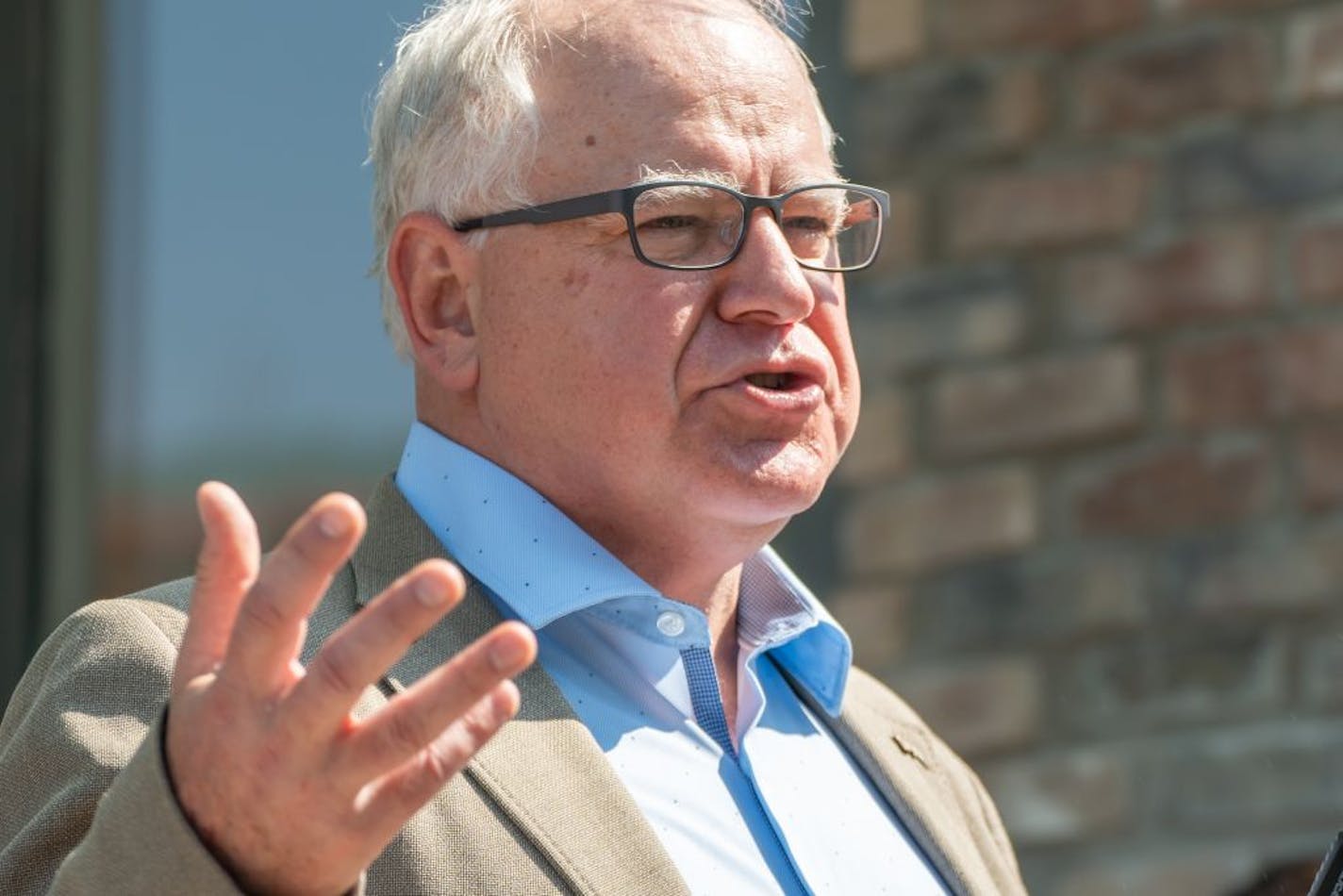 Outside Omari Brow Studio, Governor Tim Walz spoke about Wednesday night's unrest.