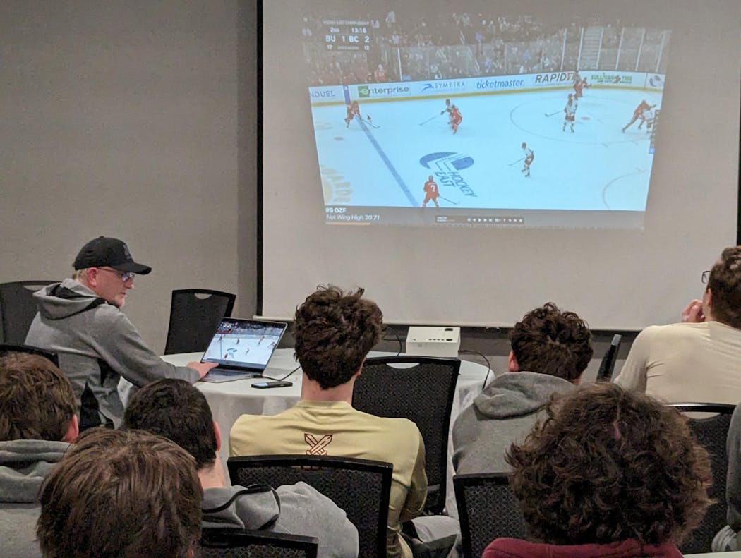 Gophers associate head coach Steve Miller leads a team film study session last Friday night at the Holiday Inn Sioux Falls. 