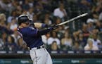 Minnesota Twins' Tyler Austin singles in the sixth inning of a baseball game against the Detroit Tigers in Detroit, Tuesday, Sept. 18, 2018.