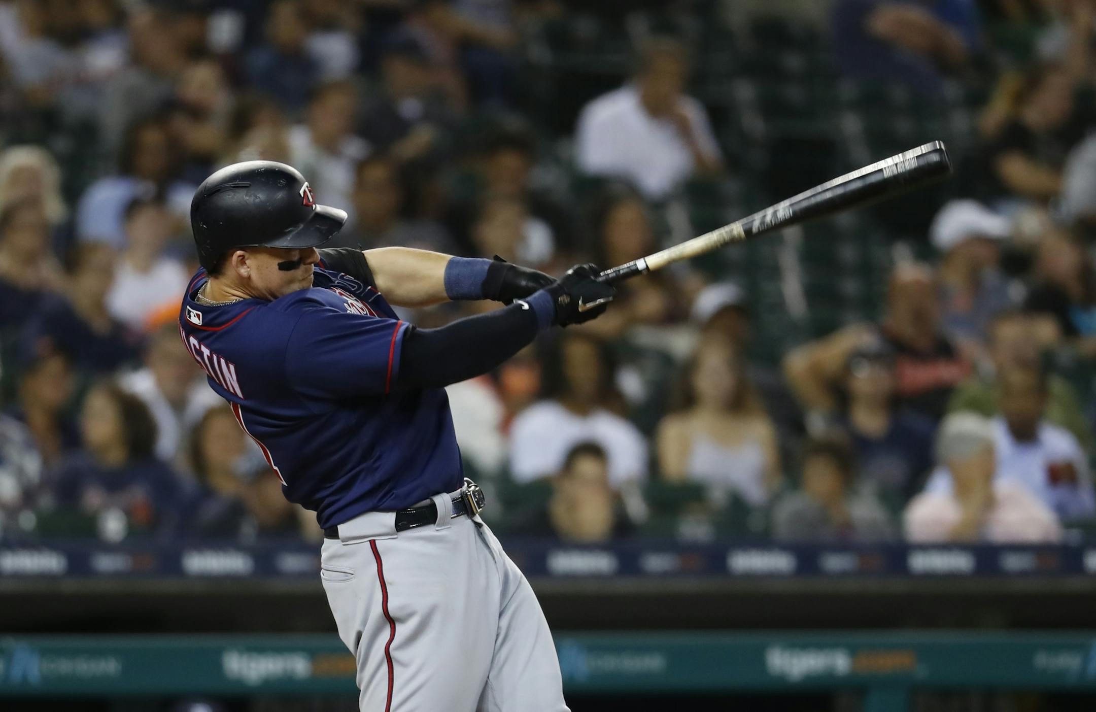 Minnesota Twins' Tyler Austin singles in the sixth inning of a baseball game against the Detroit Tigers in Detroit, Tuesday, Sept. 18, 2018.
