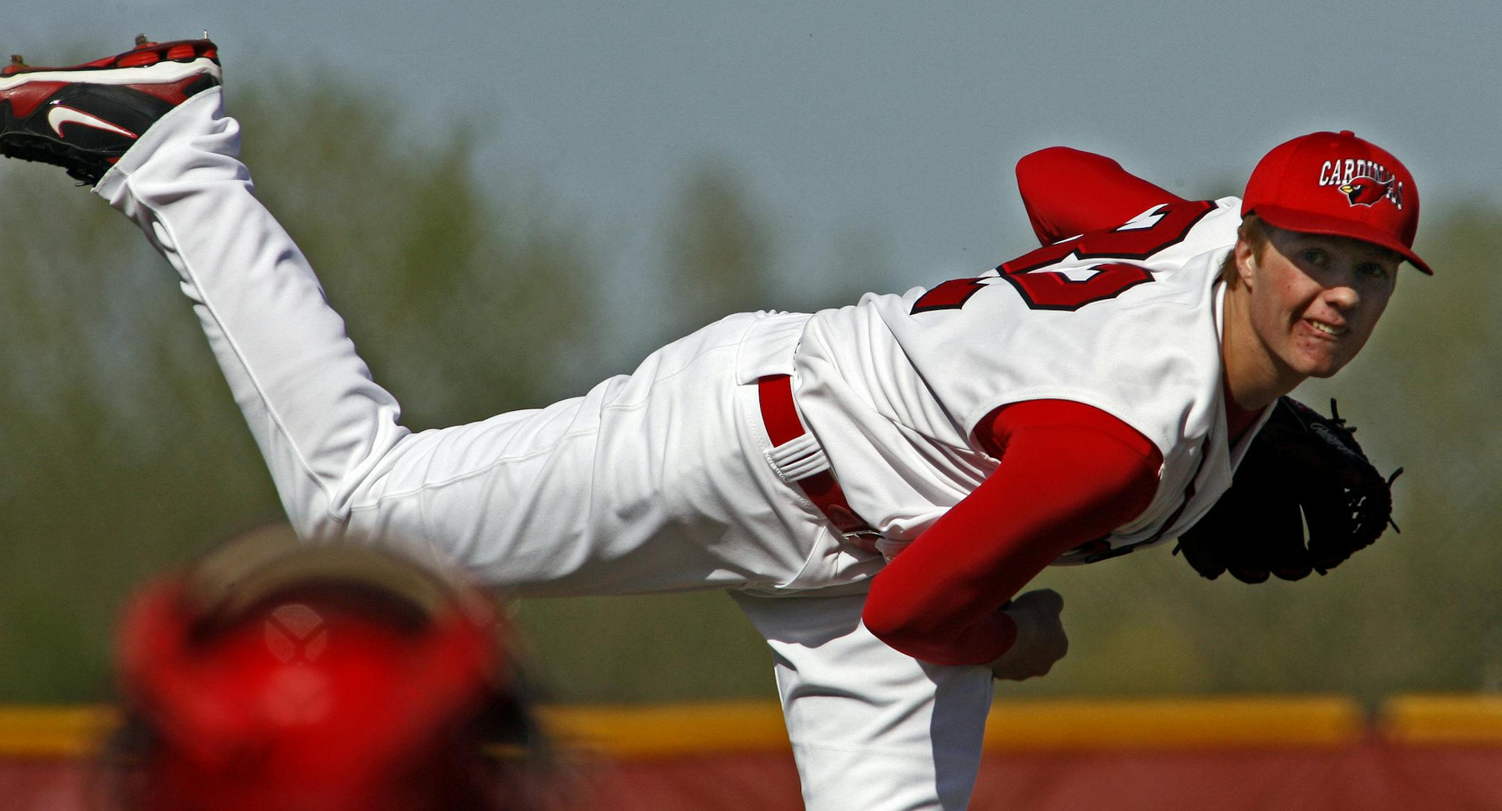 MARLIN LEVISON * mlevison@startribune.com April 15, 2010 - GENERAL INFORMATION: Logan Shore is a freshman pitcher on the Coon Rapids high school baseball team and one of the top prep baseball prospects in the metro area. IN THIS PHOTO: ] Logan Shore pitching. ORG XMIT: MIN2013061715090466