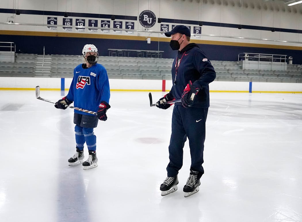 Team USA coach Joel Johnson worked with one of his stars, Amanda Kessel, recently at the National Sports Center in Blaine.