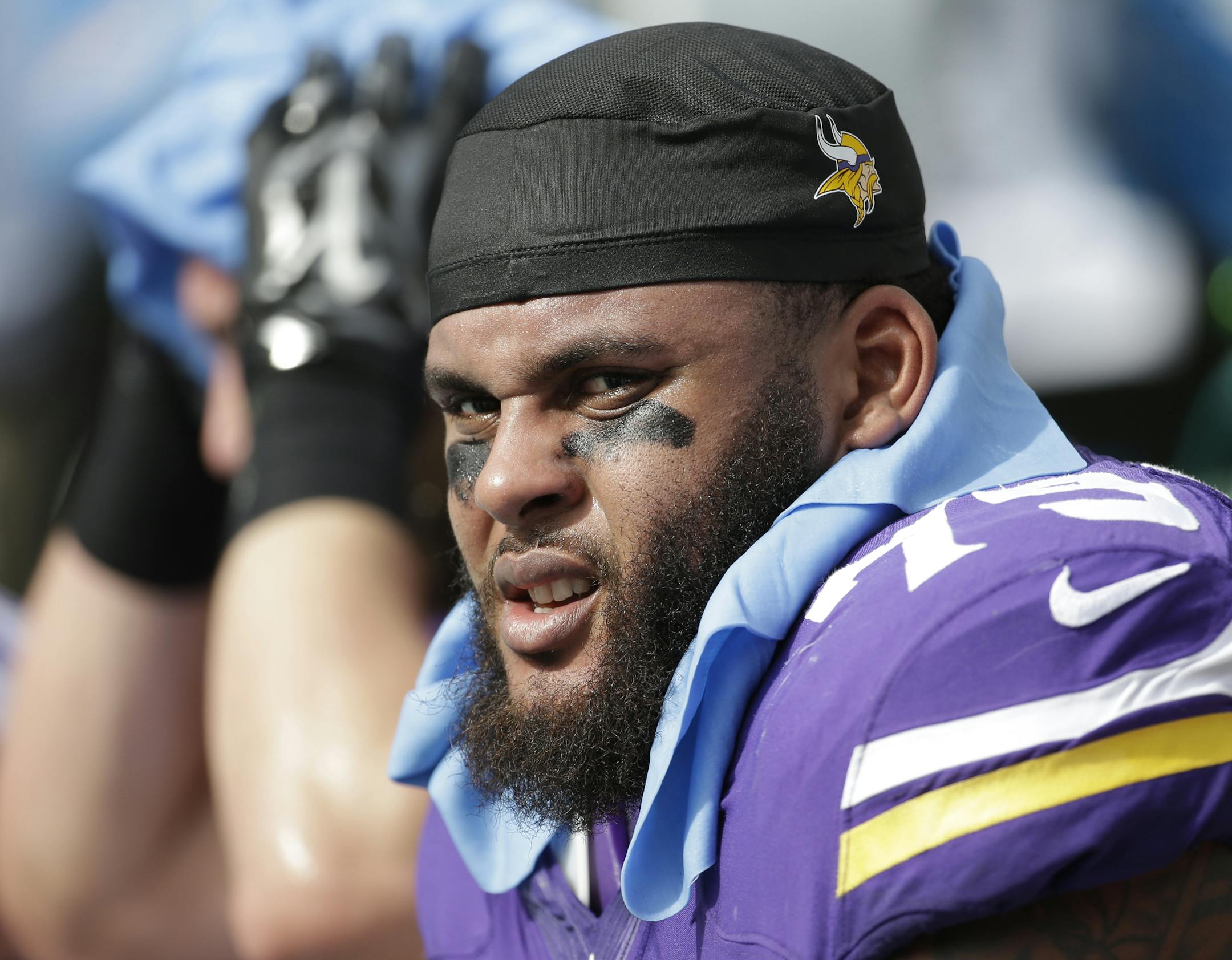 Minnesota Vikings tackle Michael Harris (79) rests on the sidelines during the first half of an NFL football game against the Miami Dolphins, Sunday, Dec. 21, 2014, in Miami Gardens, Fla. (AP Photo/Lynne Sladky) ORG XMIT: OTK