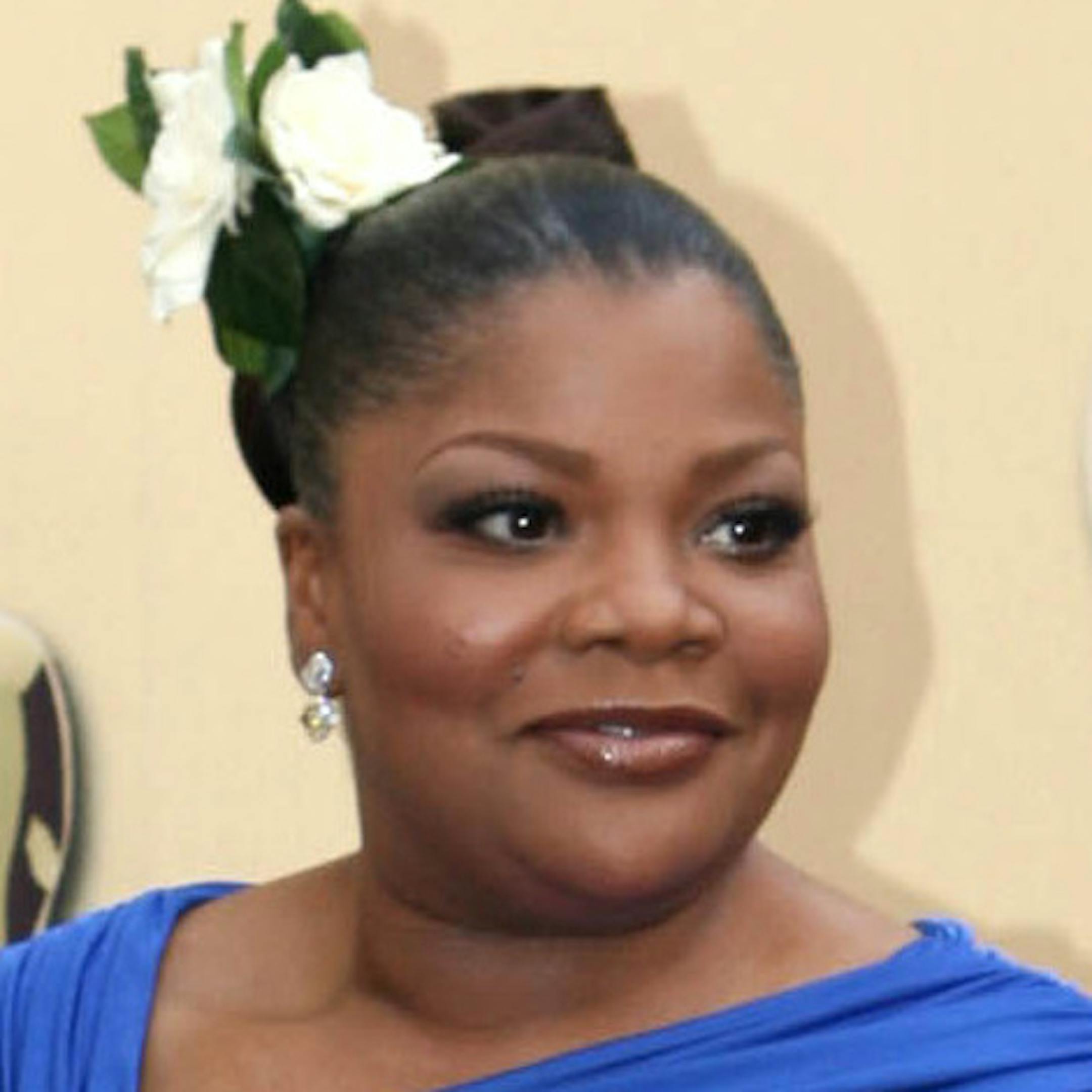 Mo'Nique, right, nominated for best performance by an actress in a supporting role for "Precious: Based on the Novel 'Push' by Sapphire," is joined by husband Sidney Hicks at the 82nd Academy Awards Sunday, March 7, 2010, in the Hollywood section of Los Angeles. (JOSH HANER/The New York Times)