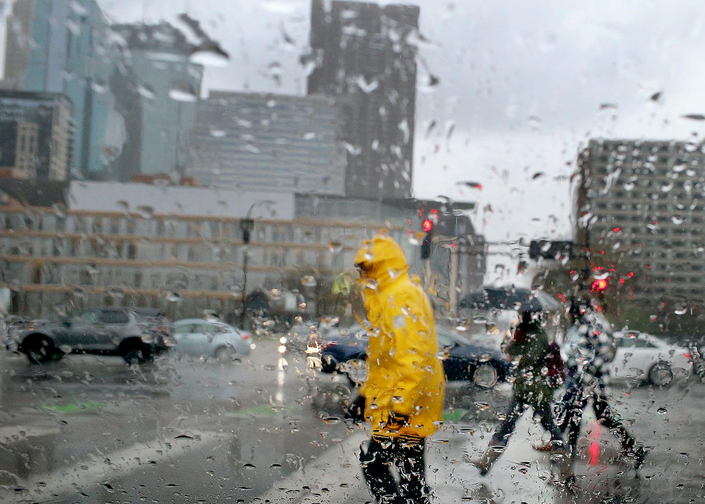 Steady rain fell on pedestrians crossing Hennepin Ave. near the Hennepin Ave. Bridge Wednesday, May 8, 2019, in Minneapolis, MN.] DAVID JOLES &#x2022;david.joles@startribune.com Rainy Wednesday