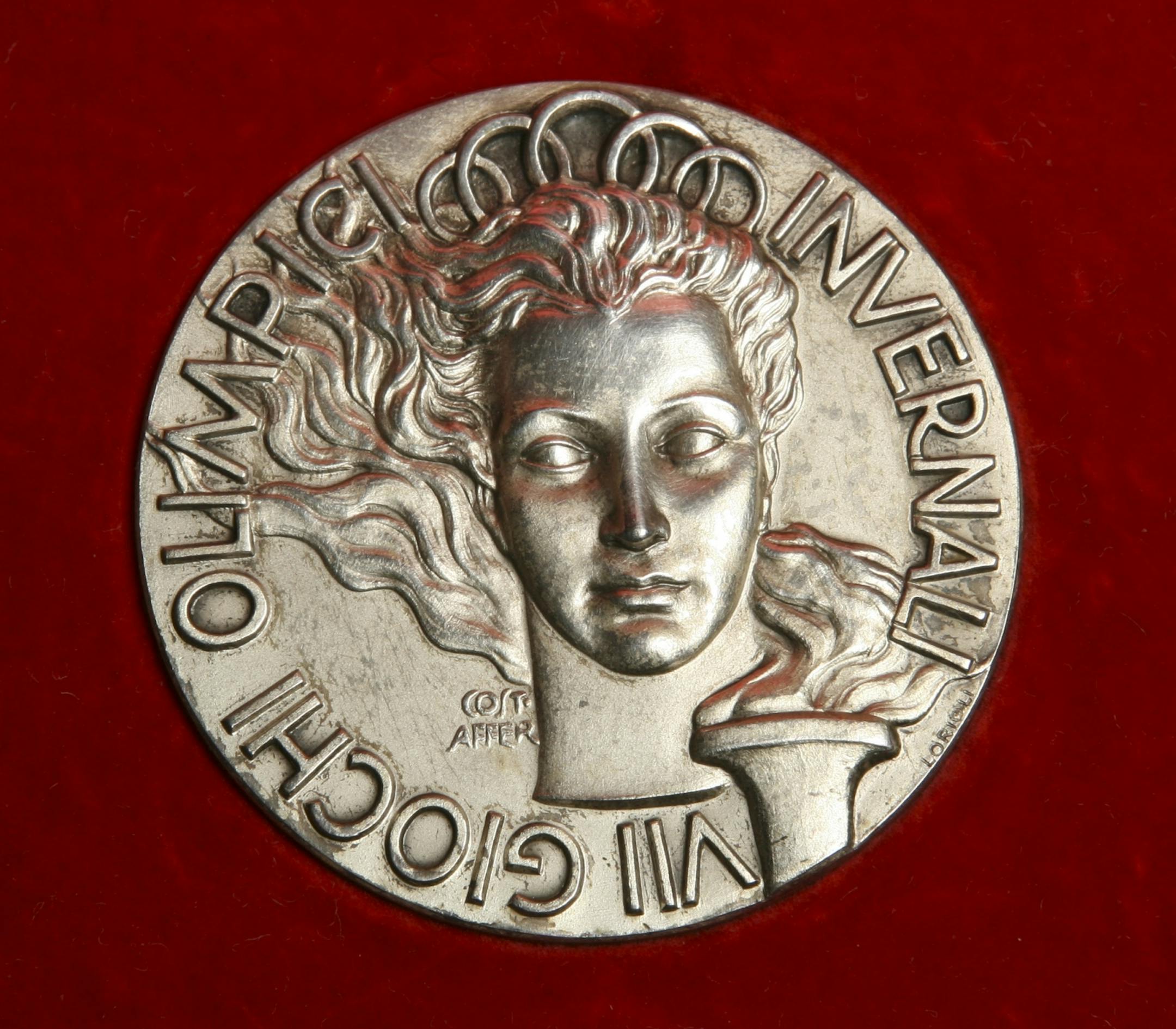 Detail of the silver medal Dick Meredith earned at the 1956 Olympics. GENERAL INFORMATION: JEFF WHEELER � jwheeler@startribune.com MINNEAPOLIS - 1/25/06 - Dick Meredith and former Gov. Wendell Anderson were two of eleven Minnesotans on the silver medal-winning U.S. Olympic hockey team of 50 years ago.