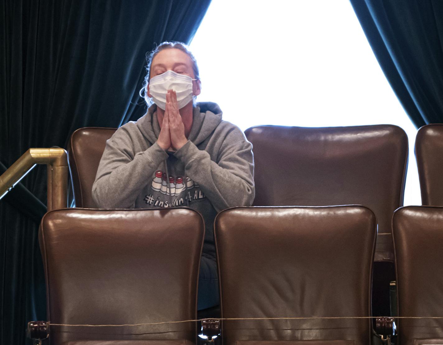 Nicole Smith-Holt is pictured in the Minnesota House gallery in St. Paul, Minn. on April 14, 2020. Smith-Holt pushed insulin affordability legislation inspired by her son Alec, who died because he tried to ration his insulin. A pharmaceutical industry group is suing to block the law, which takes effect on Wednesday.