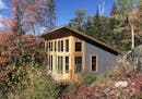 Home of the Month: A one-room cabin on Ripple Island near Ely, Minn., combines a classic pine interior with a sleek metal exterior. Designed by archit