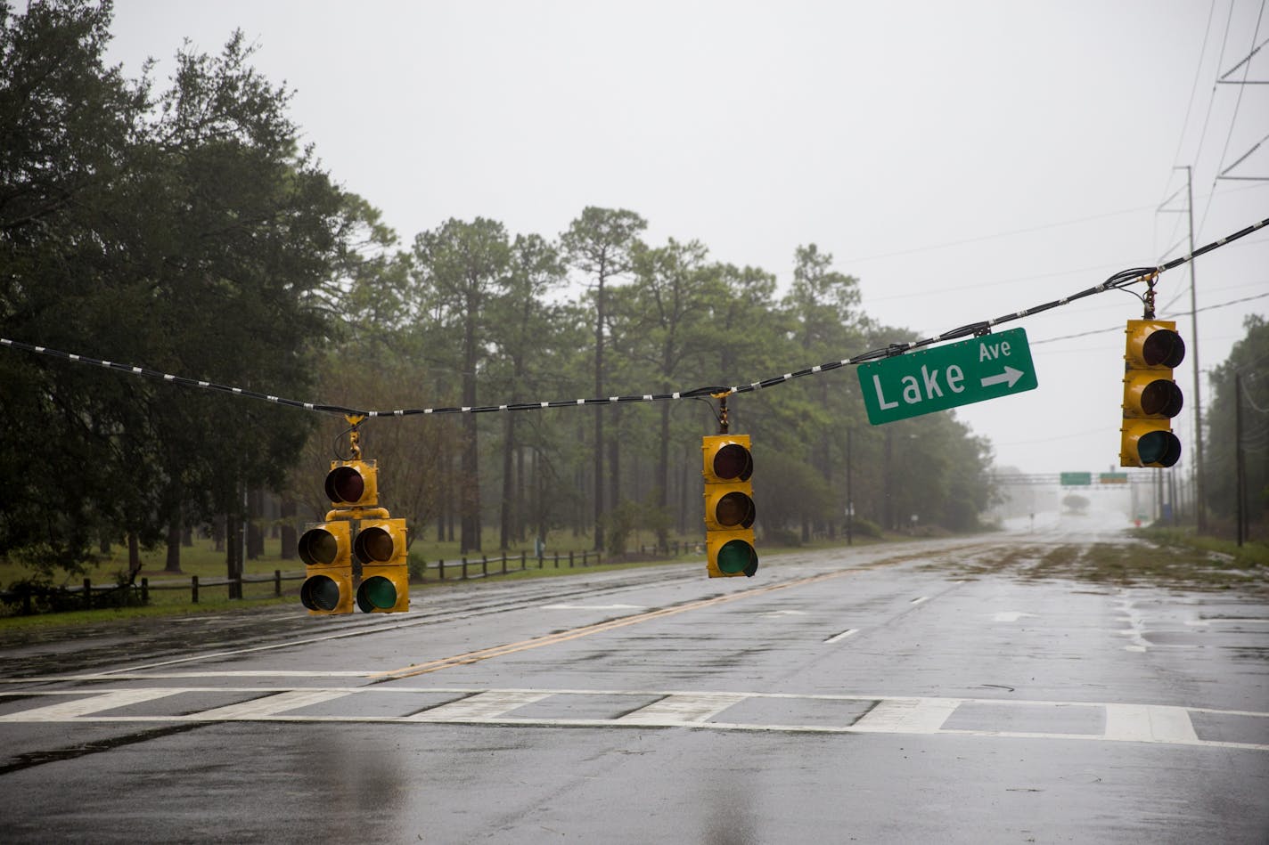 Downed traffic lights as Hurricane Florence swept through the area in Wilmington, N.C., on Sept. 14, 2018. Florence, lashing the North Carolina coast with strong winds and blinding rain, made landfall Friday morning having already driven dangerous storm surges of several feet into beach and river towns. The eye of the storm came ashore at Wrightsville Beach, N.C., just east of Wilmington, with winds of about 90 miles an hour.