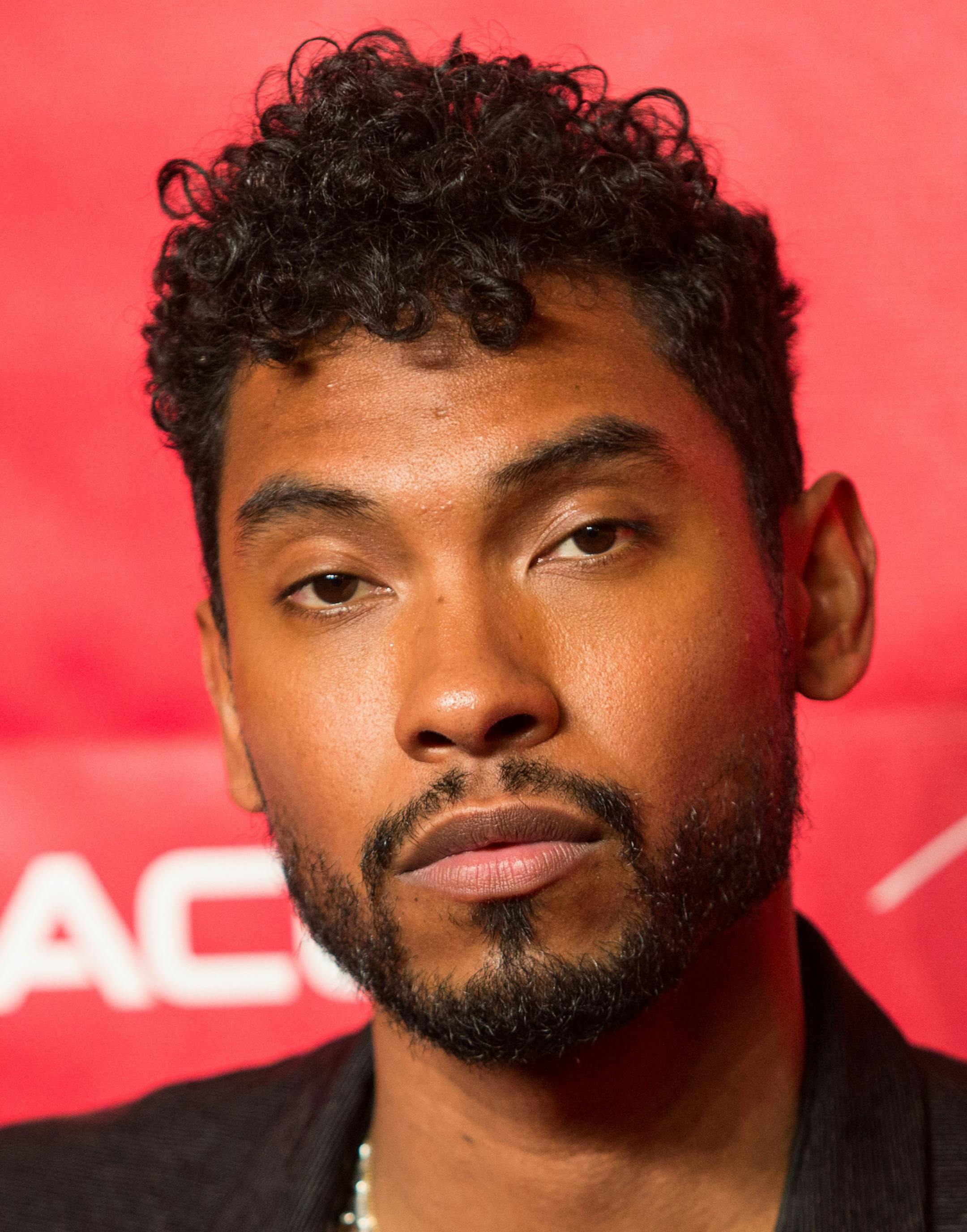 Singer Miguel arrives at the MusiCares 2014 Person of the Year Tribute on Friday, January 24, 2014 in Los Angeles. (Photo by Paul A. Hebert/Invision/AP) ORG XMIT: INVW ORG XMIT: MIN1506301946351021