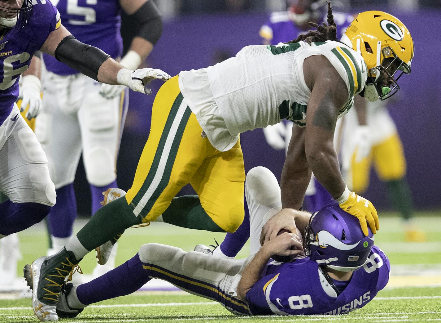 Green Bay Packers Za'darius Smith (55) sacked Minnesota Vikings quarterback Kirk Cousins (8) in the fourth quarter. ] CARLOS GONZALEZ &#x2022; cgonzalez@startribune.com &#x2013; Minneapolis, MN &#x2013; December 23, 2019, U.S. Bank Stadium, NFL, Minnesota Vikings vs. Green Bay Packers