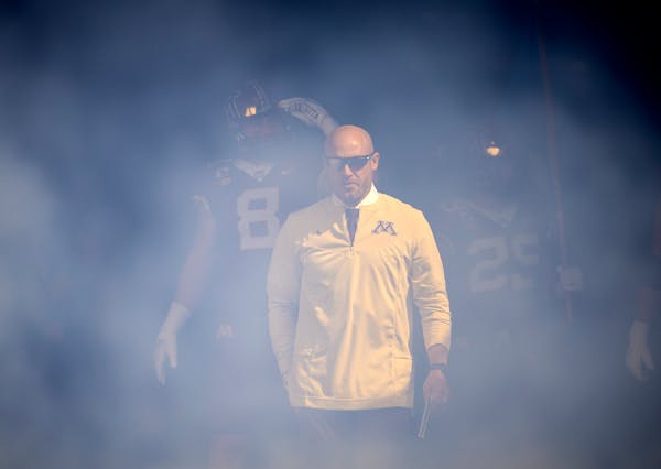 P.J. Fleck made his way through the tunnel and onto the field before the Gophers played Colorado.