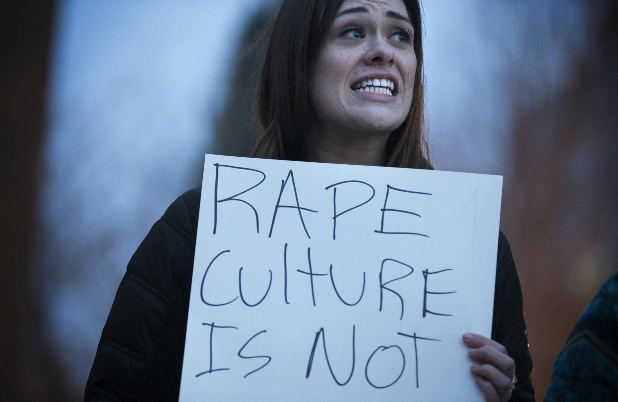 University of Minnesota student Claire Erickson, 19, protests a talk by Milo Yiannopoulos and Christina Hoff Sommers outside the Humphrey Institute of Public Affairs on the campus of the University of Minnesota in Minneapolis on Wednesday, February 17, 2016.