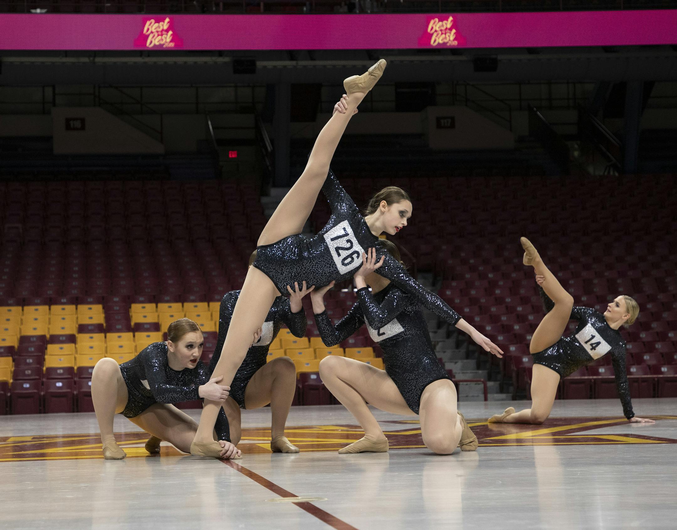 Greta Schloemer, center, and the Brainerd High School dance team.