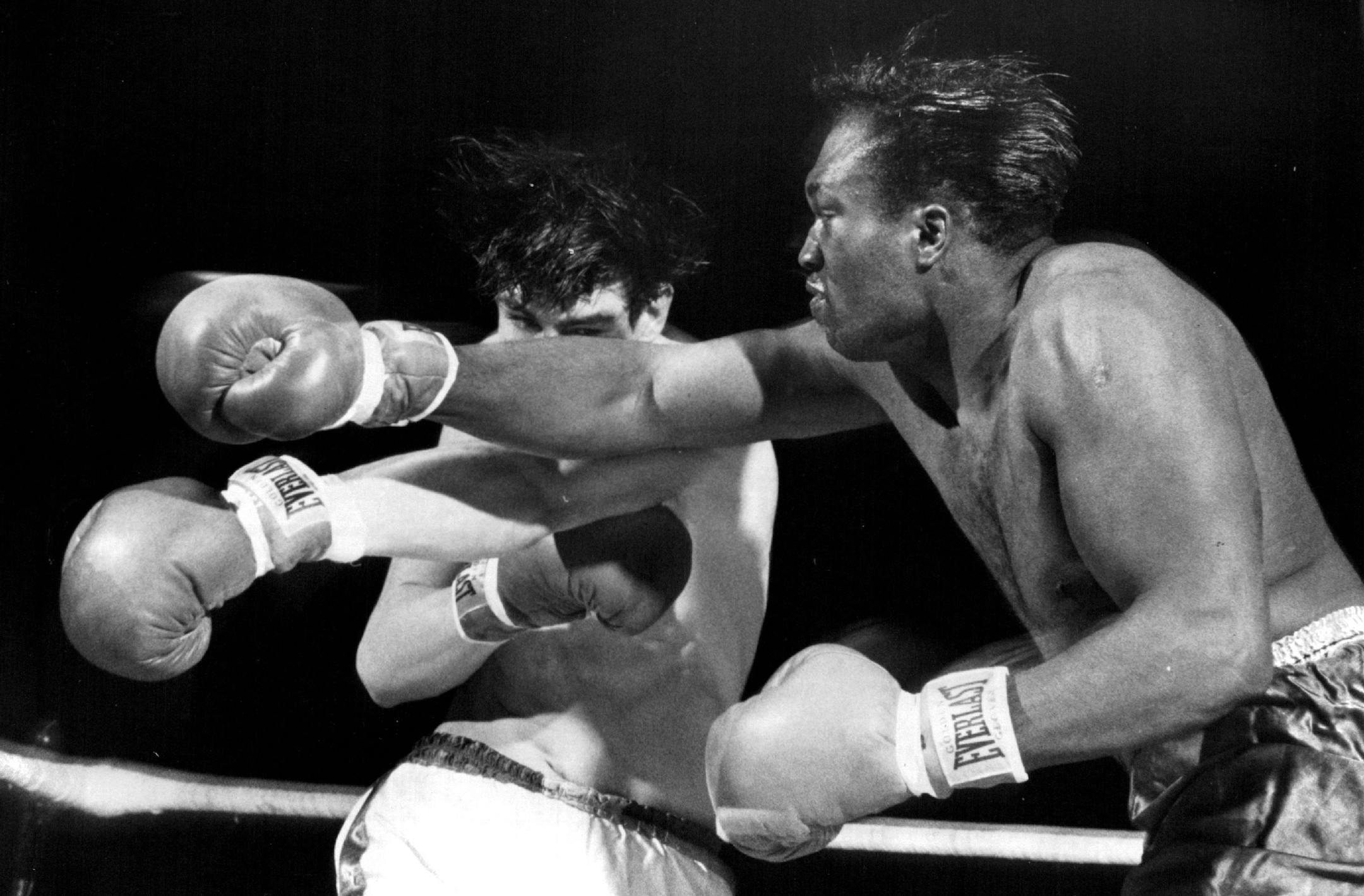 February 23, 1960 Counter - Point Jim Beattie (left) of St. Paul tries to score with a left to Charles Smith of Minneapolis while avoiding Smith's right cross in the semifinal round of heavyweight competition. Beattie decisioned Smith en route to the Upper Midwest Golden Glove heavyweight title. February 22, 1960 February 24, 1960 Minneapolis Star Tribune