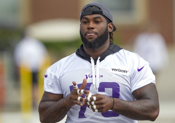 Minnesota Vikings defensive tackle Sharrif Floyd (73) during the first day of the team's NFL football training camp at Mankato State University in Man
