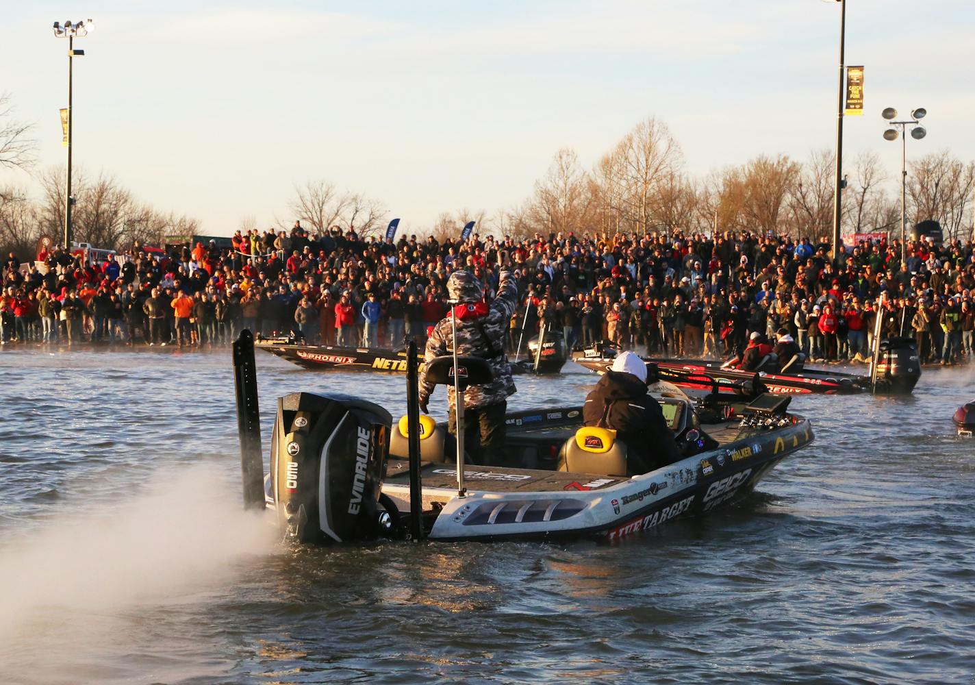 Competing anglers in the Classic paraded by a gallery of hundreds of fans.