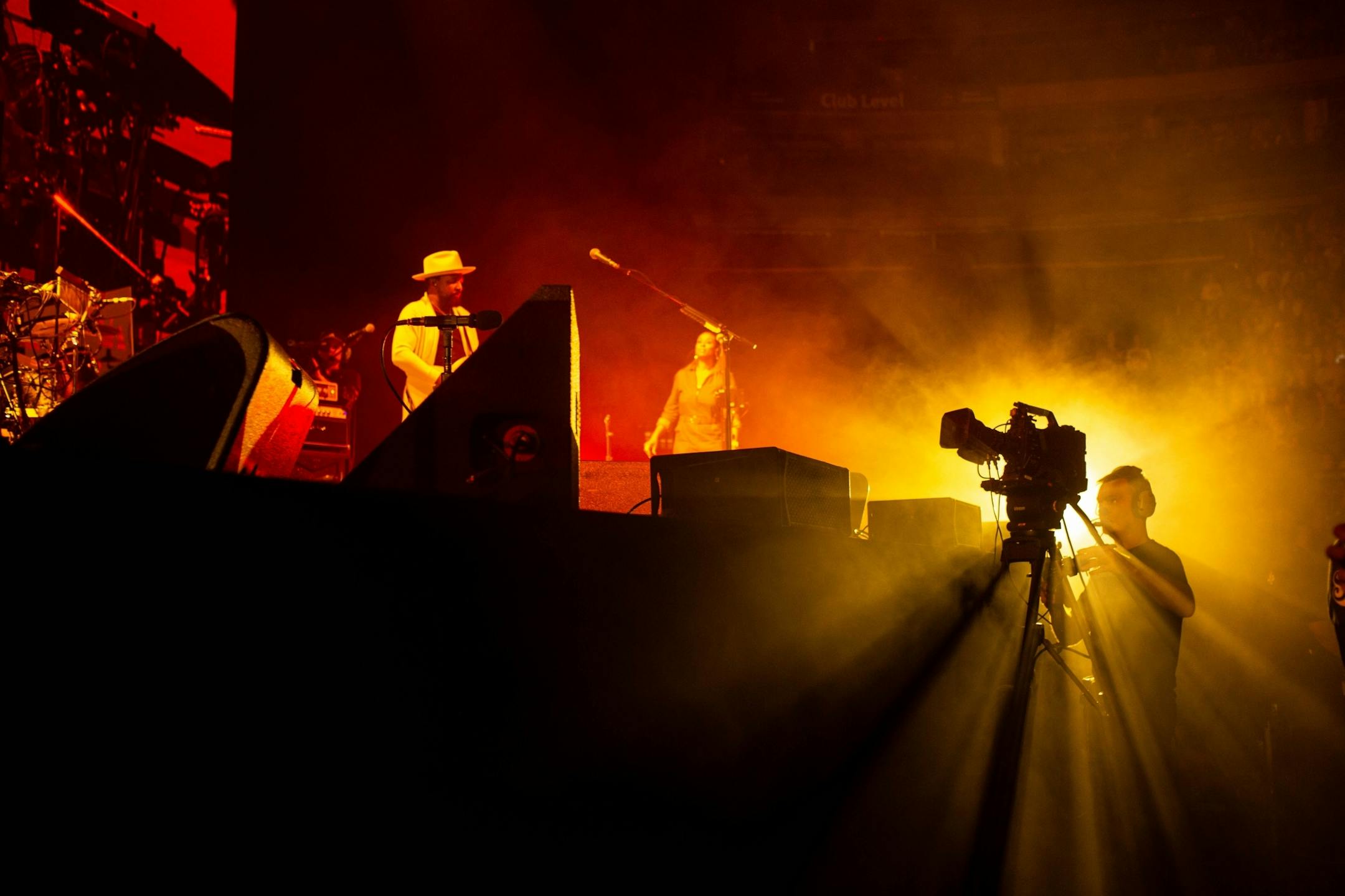 Cameramen film John Mayer as he performs at Xcel Energy Center Monday, August 5, 2019.