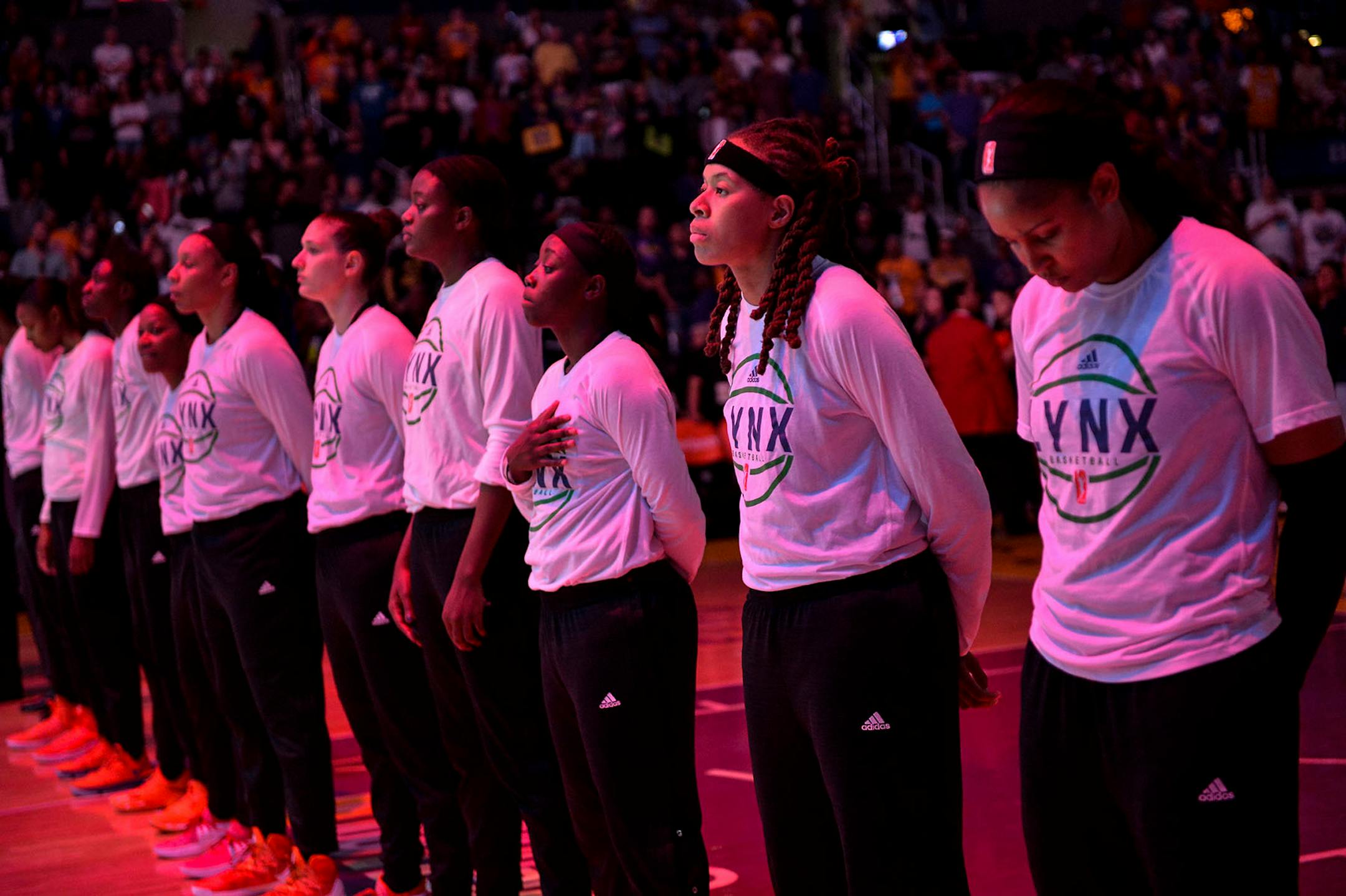 The Minnesota Lynx stood for the National Anthem without their arms crossed for the first time in the WNBA Finals.