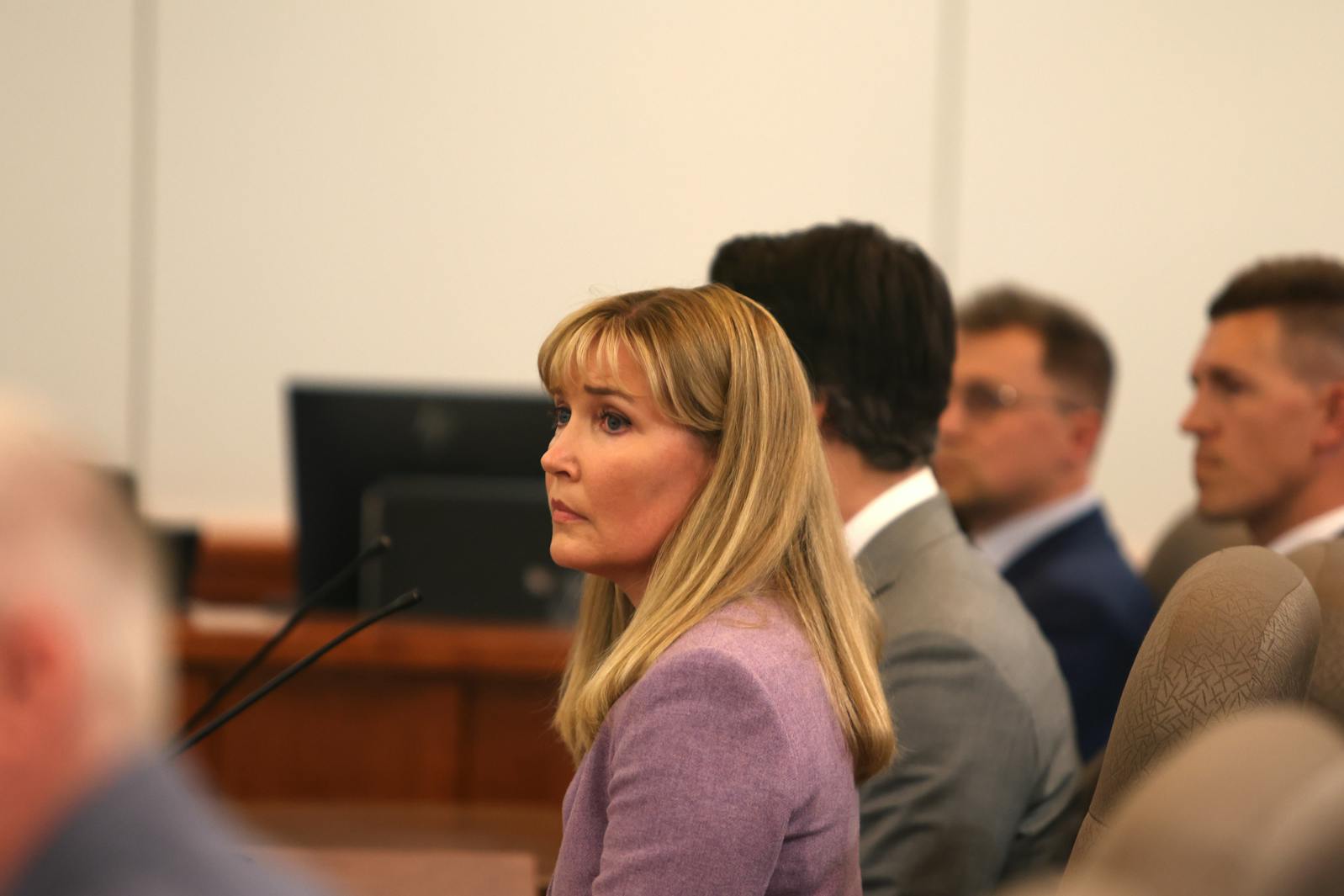 Minnesota Sen. Nicole Mitchell listens as Seventh Judicial District Chief Judge Michael Fritz reads the jury's verdict finding her guilty on both felony burglary counts during the fifth and final day of her trial on Friday, July 18, 2025, at Becker County District Court in Detroit Lakes.