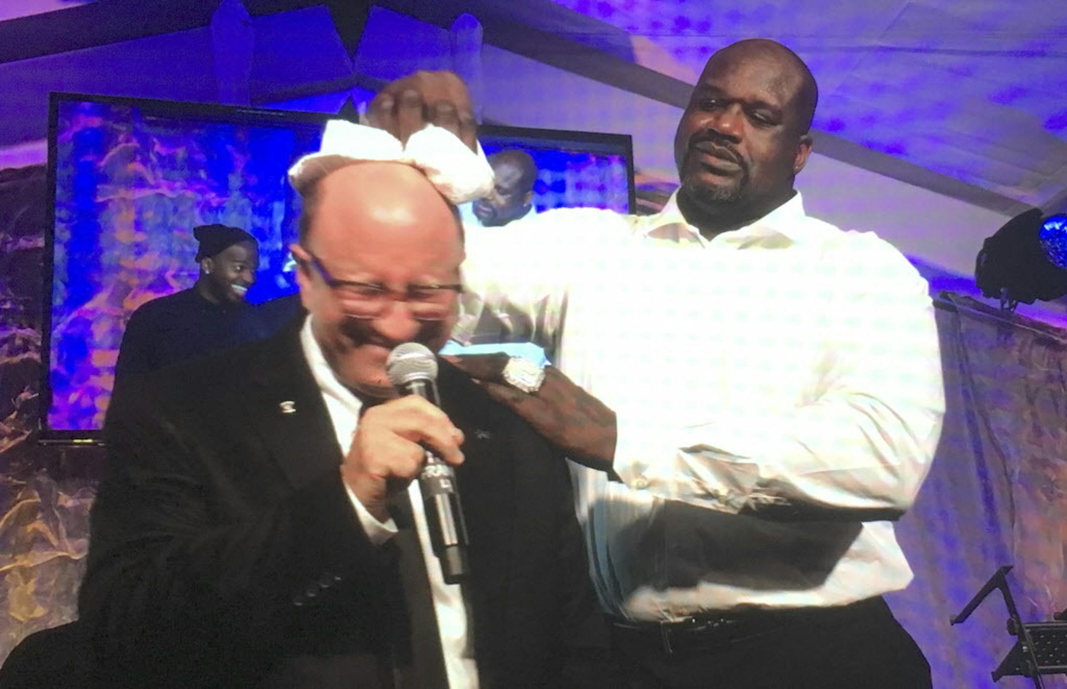 Event organizer Marc Pollick got a hand staying cool from DJ Diesel, aka Shaquille O'Neal.